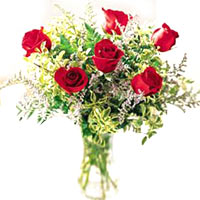 6 pcs red roses w/ greenary in a glass vase