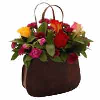 Bright Colorful Flower Arrangement in a Handbag